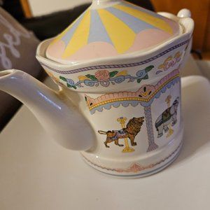 carousel porcelain teapot by j.s.n.y. Taiwan pastel colors w/lion elephant&horse